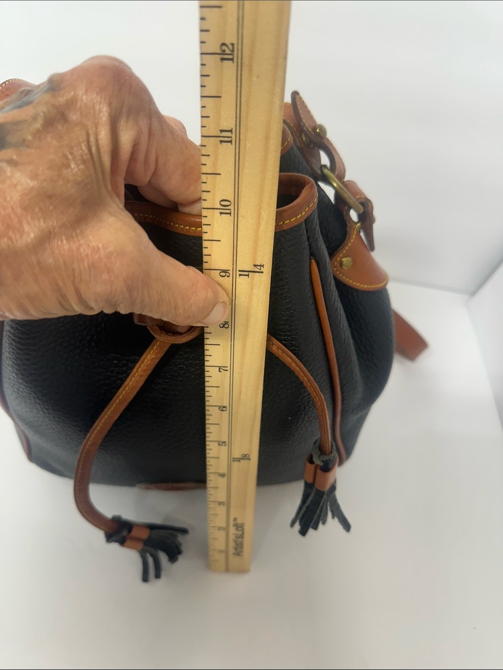 Dooney & Bourke Black Pebbled Leather Drawstring Bucket Bag with Tan Trim - Picture 6 of 13